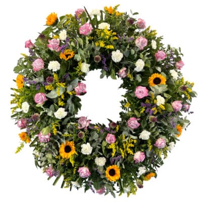 Corona funeraria de flor variada by Floraila