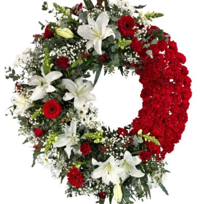 Corona funeraria Jano con clavel rojo by Floraila